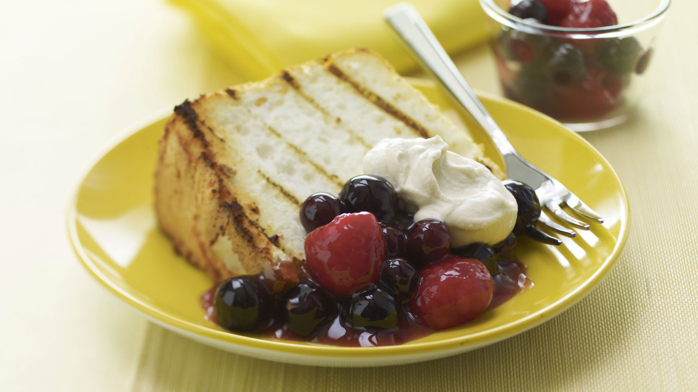 grilled_angel_food_cake_with_peppered_berries_and_vanilla_cream_2000x1125.jpg