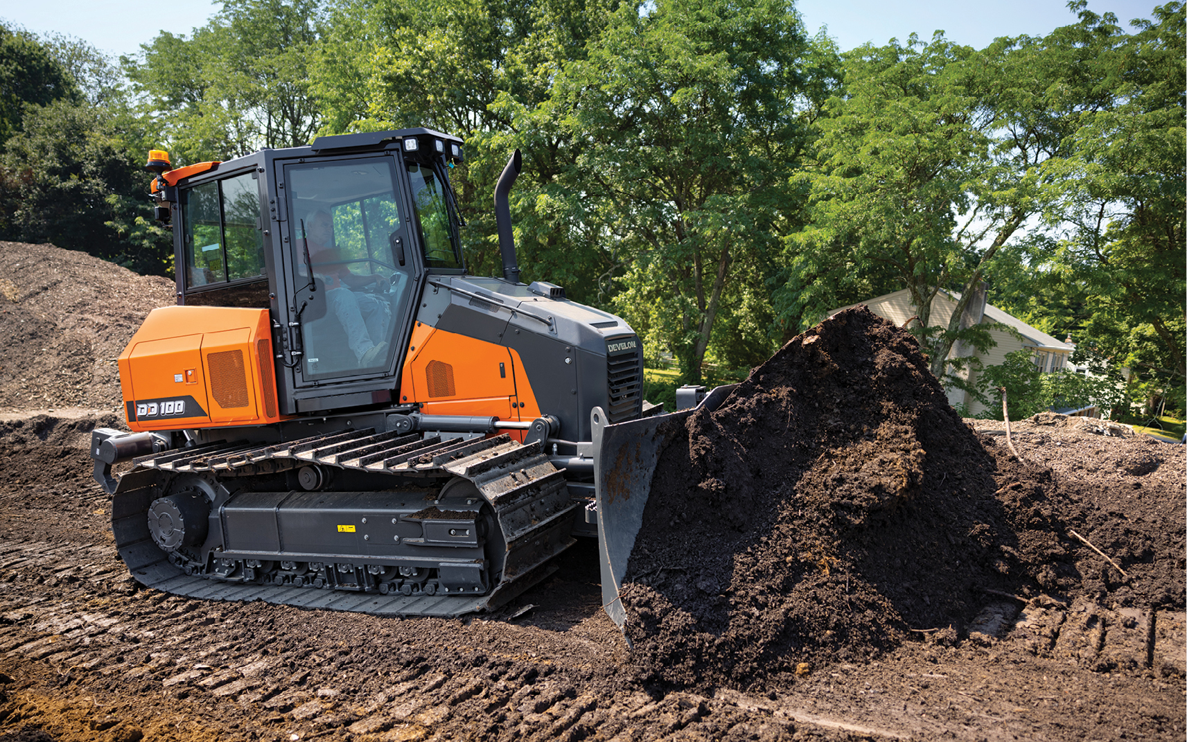 DD100 Dozer Pushing Dirt On A Jobsite.