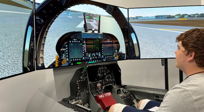 Patti's grandson in a flight simulator