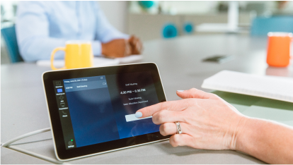 Woman reserving a room on the iPad