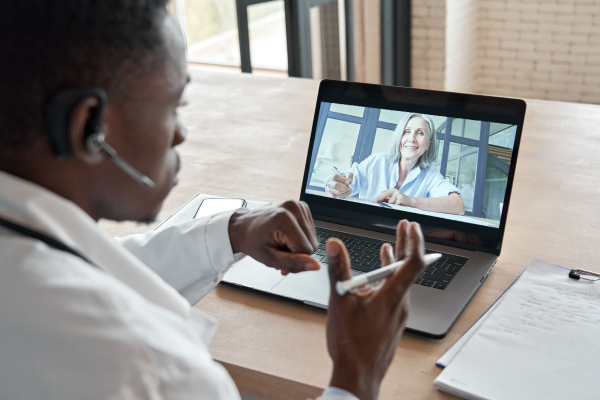 Doctor in virtual meeting