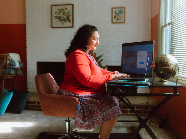 Remote Cc Woman working at desk